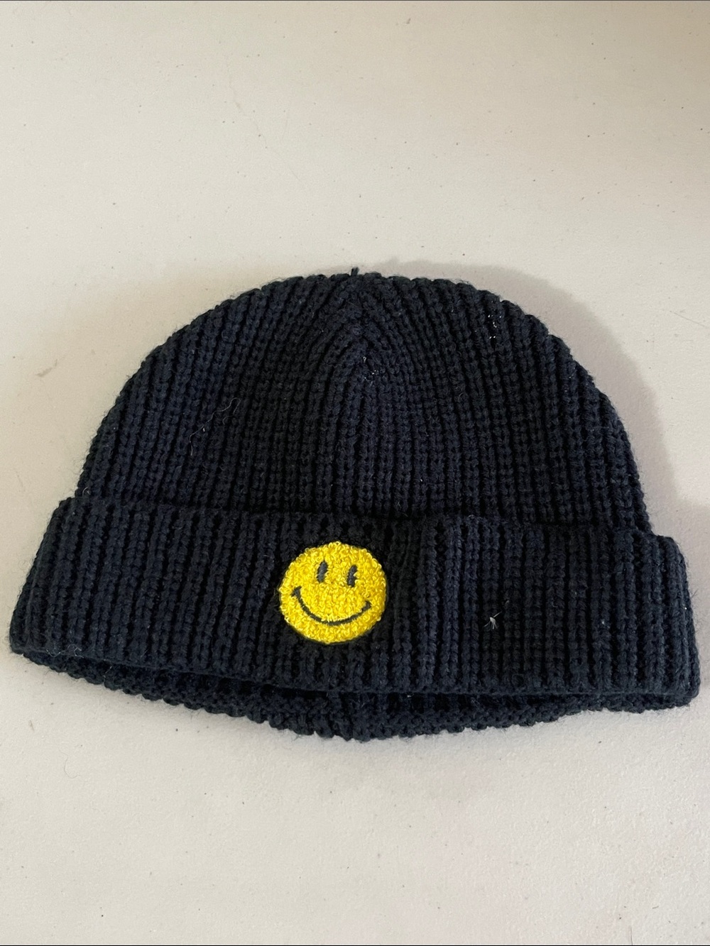 Market Black Ribbed Beanie with Yellow Smiley Patch
